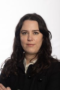 A portrait of Alice Grundy against a white background.